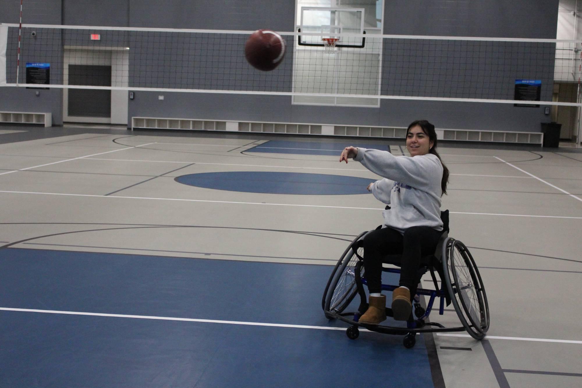 students playing wheelchair football